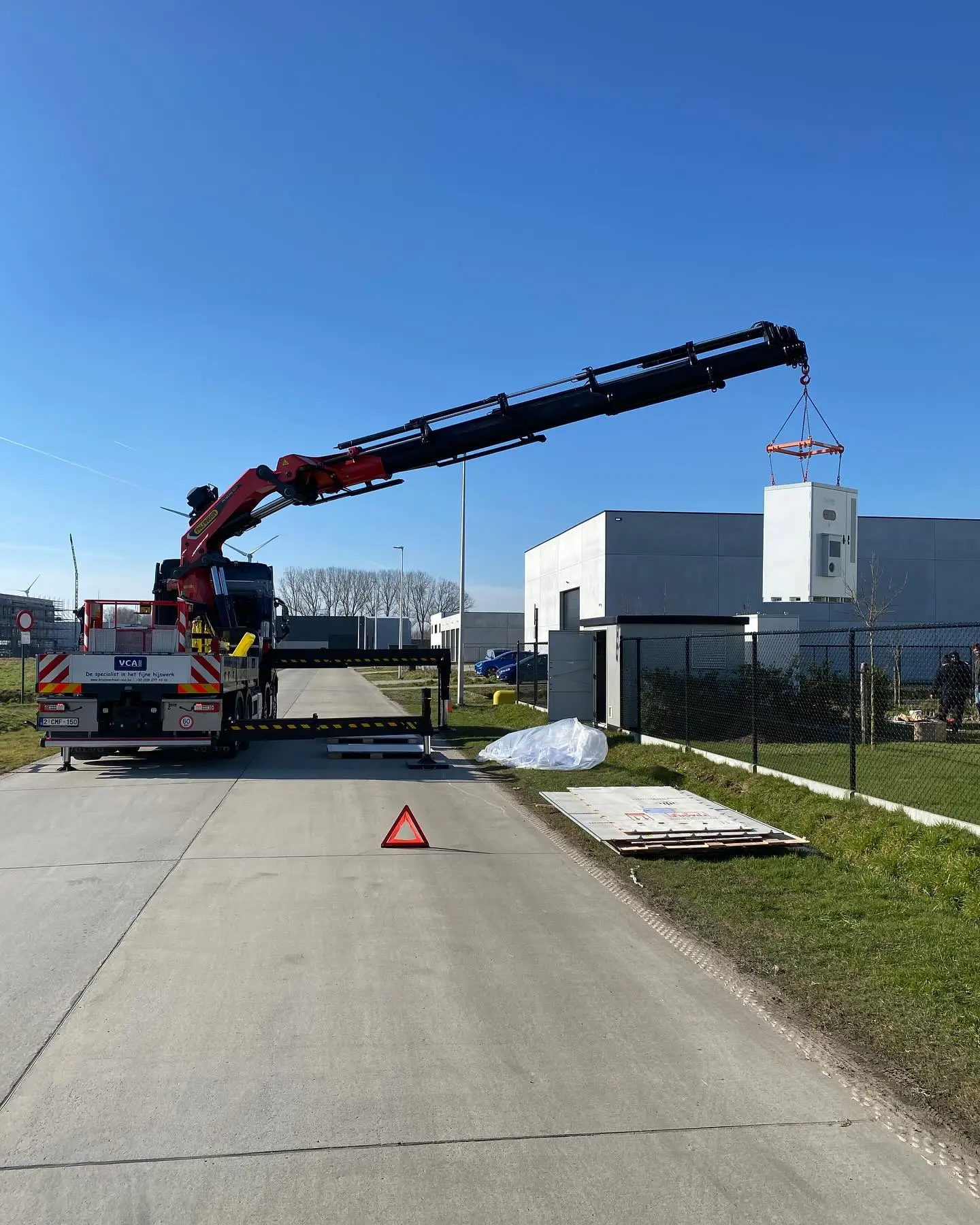 Een stevige dag voor onze autolaadkraan