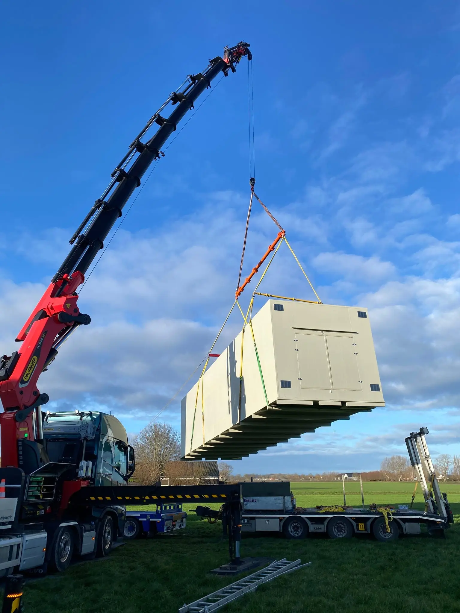 Vervangen van luchtwasser met autolaadkraan in Koksijde